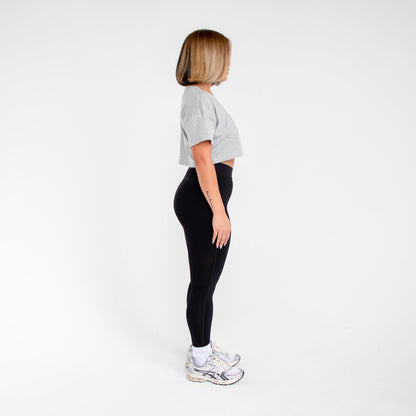 Women's loose cropped tee from POS Wholesale, casual crop top with a relaxed fit, displayed on a neutral background.