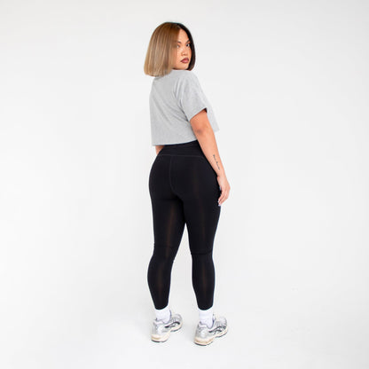 Women's loose cropped tee from POS Wholesale, casual crop top with a relaxed fit and short sleeves.