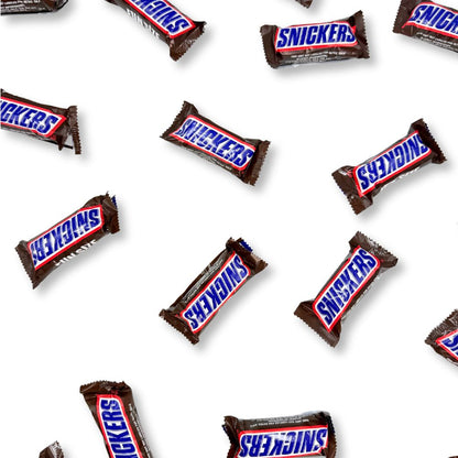 Fun size Snickers chocolate candy bars from Candy In Bulk, shown in a bulk value bag, with chocolate coating and caramel filling.