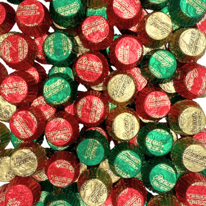 Assorted Reese's Miniature Milk Chocolate and Peanut Butter Cups in Christmas foil wrappers, bulk candy by Candy In Bulk.