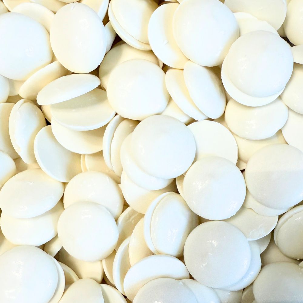 White vanilla-flavored chocolate coating and melting wafers by Candy In Bulk in a large bulk bag, perfect for candy making.