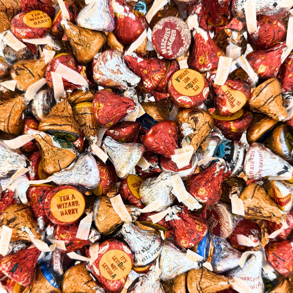 Hershey's Kisses Milk Chocolate candies with Harry Potter themed foils in a bulk value bag, produced by Candy In Bulk.