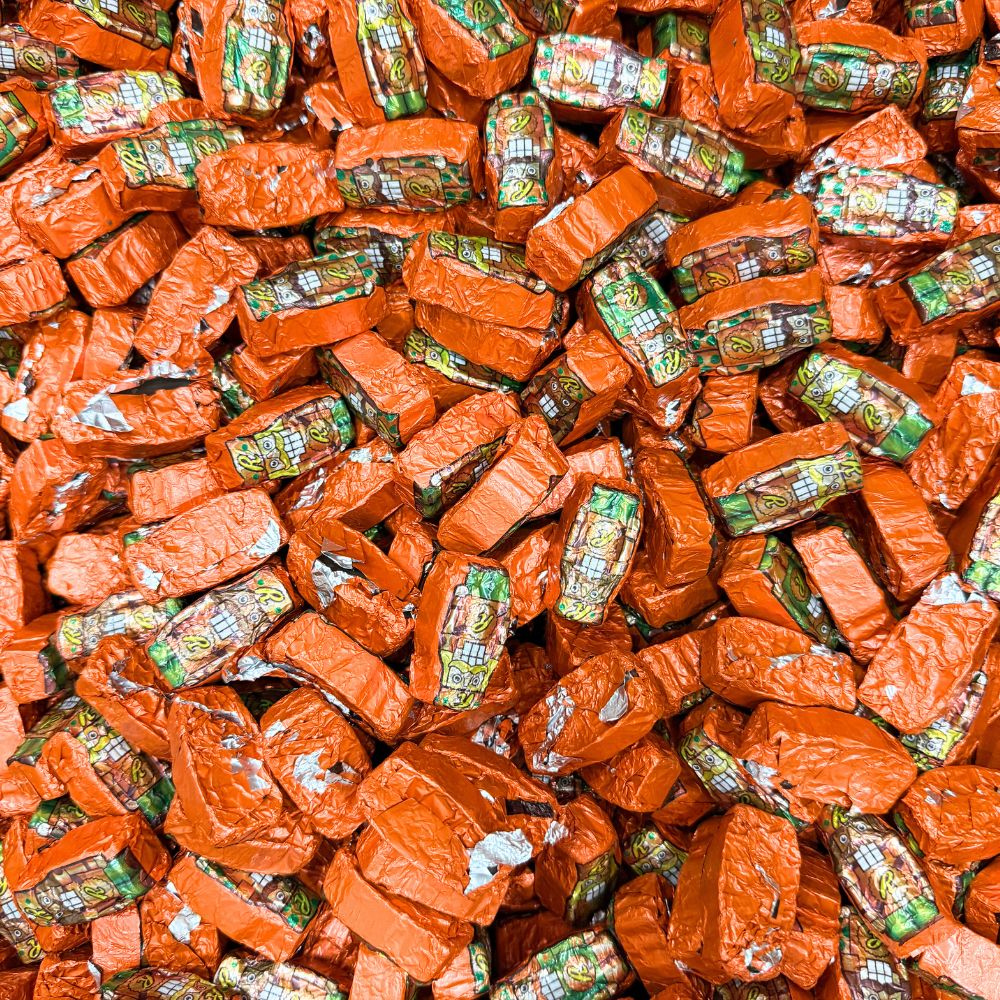 Three Reese's Milk Chocolate Peanut Butter Nutcrackers from Candy In Bulk in a bulk value bag, showcasing their chocolate and peanut butter coating