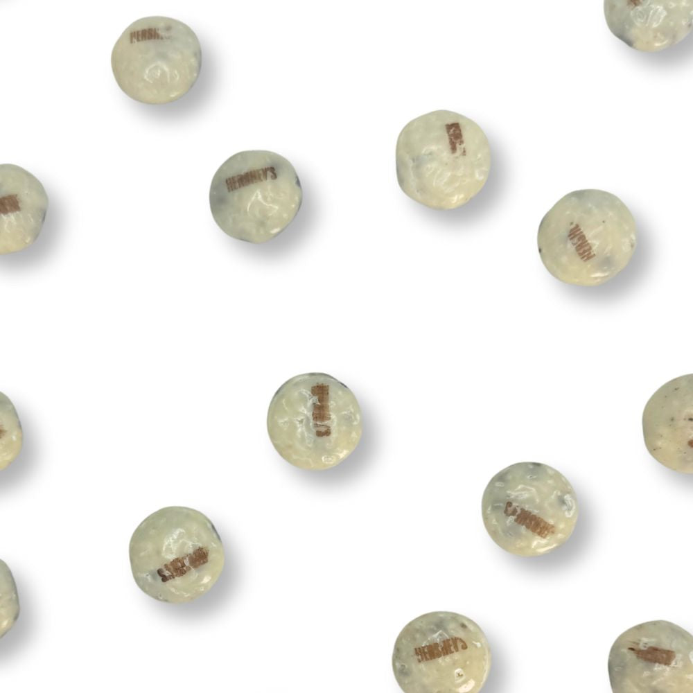 Hershey's Cookies 'N' Creme chocolate drops in a bulk value bag, featuring white and cookie-filled chocolates from Candy In Bulk.