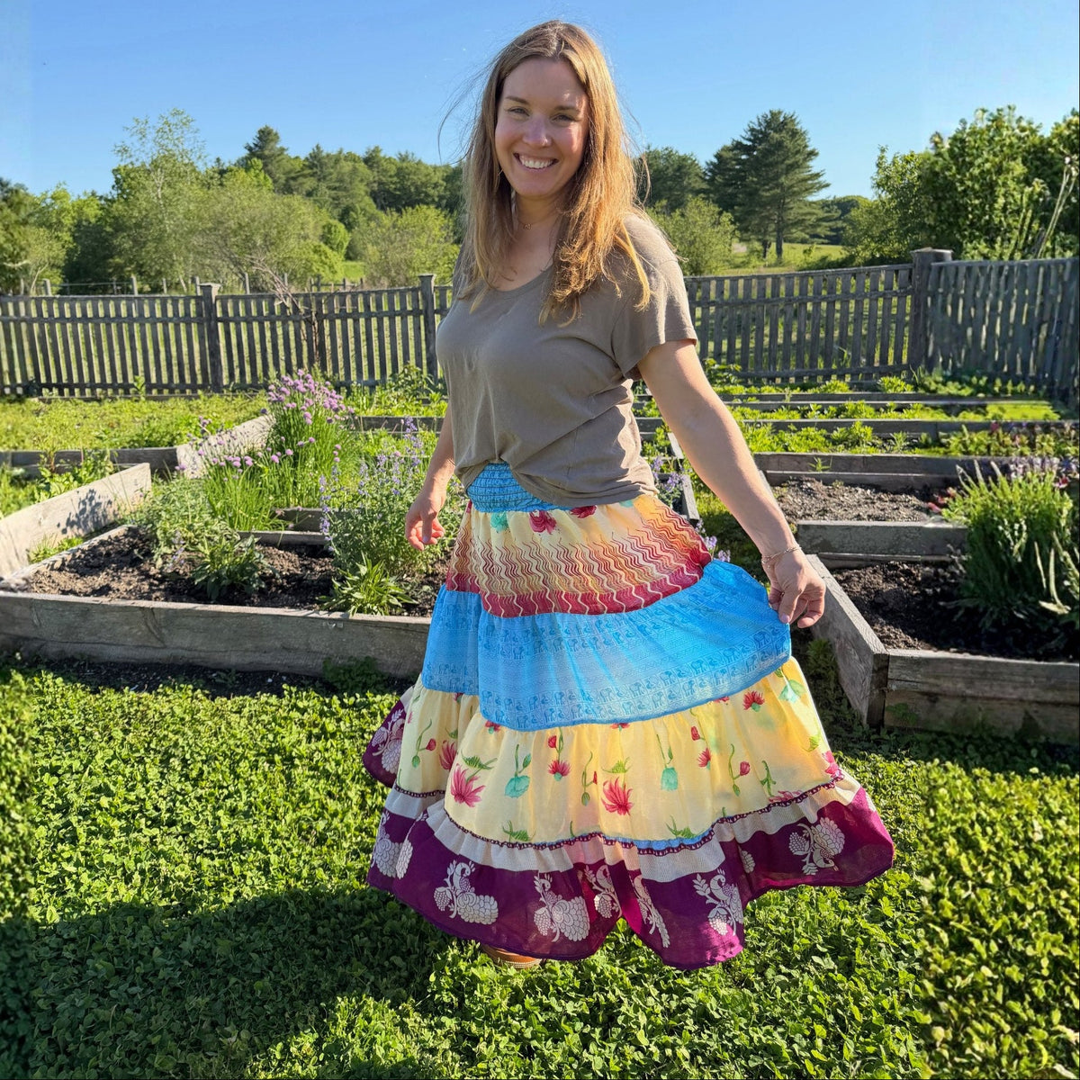 Limited edition Woodstock Dreams Fiesta Sunset skirt by Darn Good Yarn featuring vibrant, bohemian-inspired fabric and flowing design.