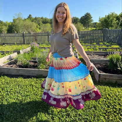 Limited edition Woodstock Dreams Fiesta Sunset skirt by Darn Good Yarn featuring vibrant, bohemian-inspired fabric and flowing design.