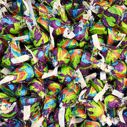 Hershey's Kisses Cinnamon Toast Crunch flavored chocolate candies in a bulk value bag, showing the shiny wrapped chocolates.