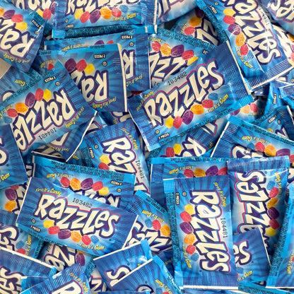 Assorted fruit-flavored Razzles Original Candy Gum in a bulk value bag by Candy In Bulk, showing colorful gum pieces.