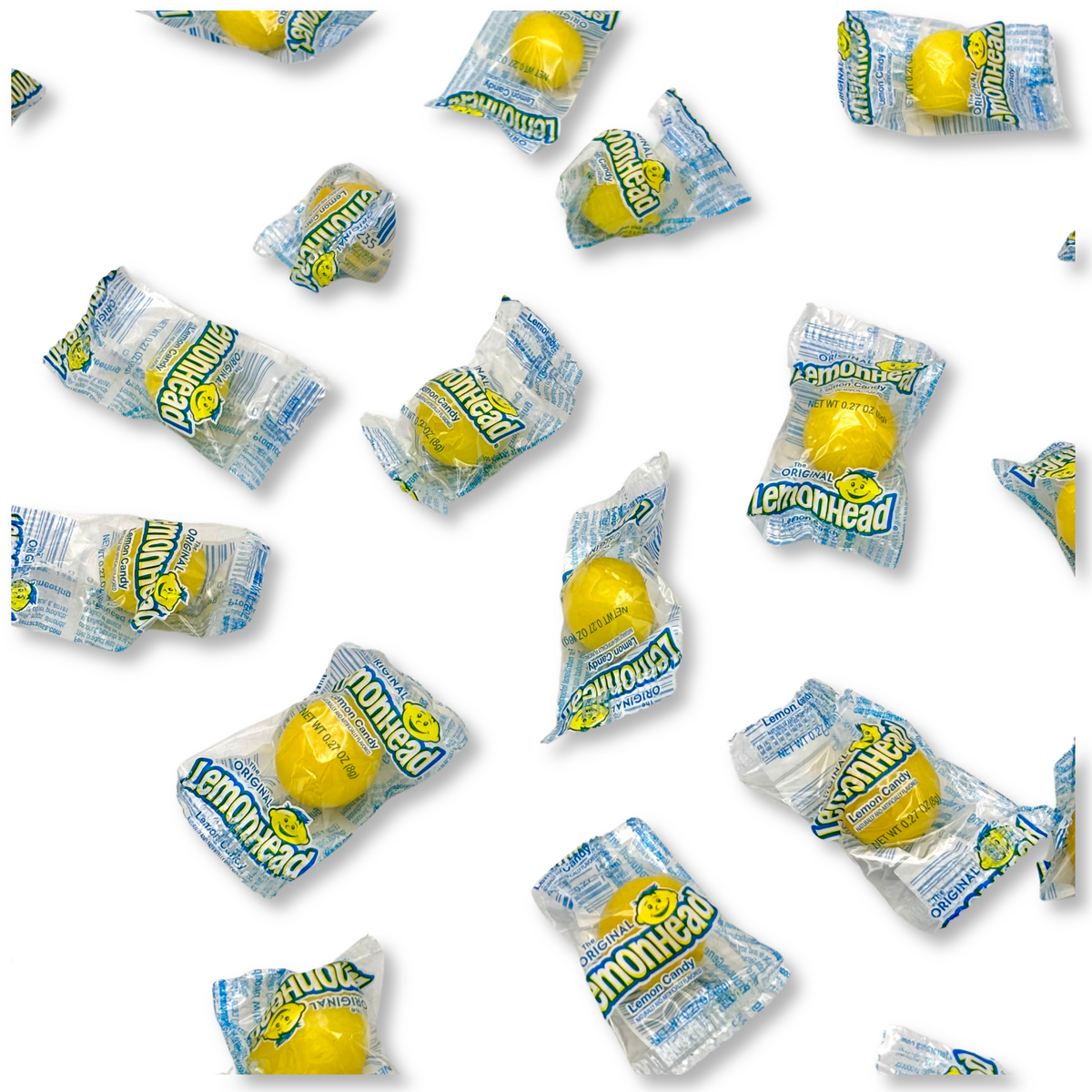 Bulk Lemonhead Original Lemon Hard Candy from Candy In Bulk, showing bright yellow, round lemon-flavored candies in a clear bag.