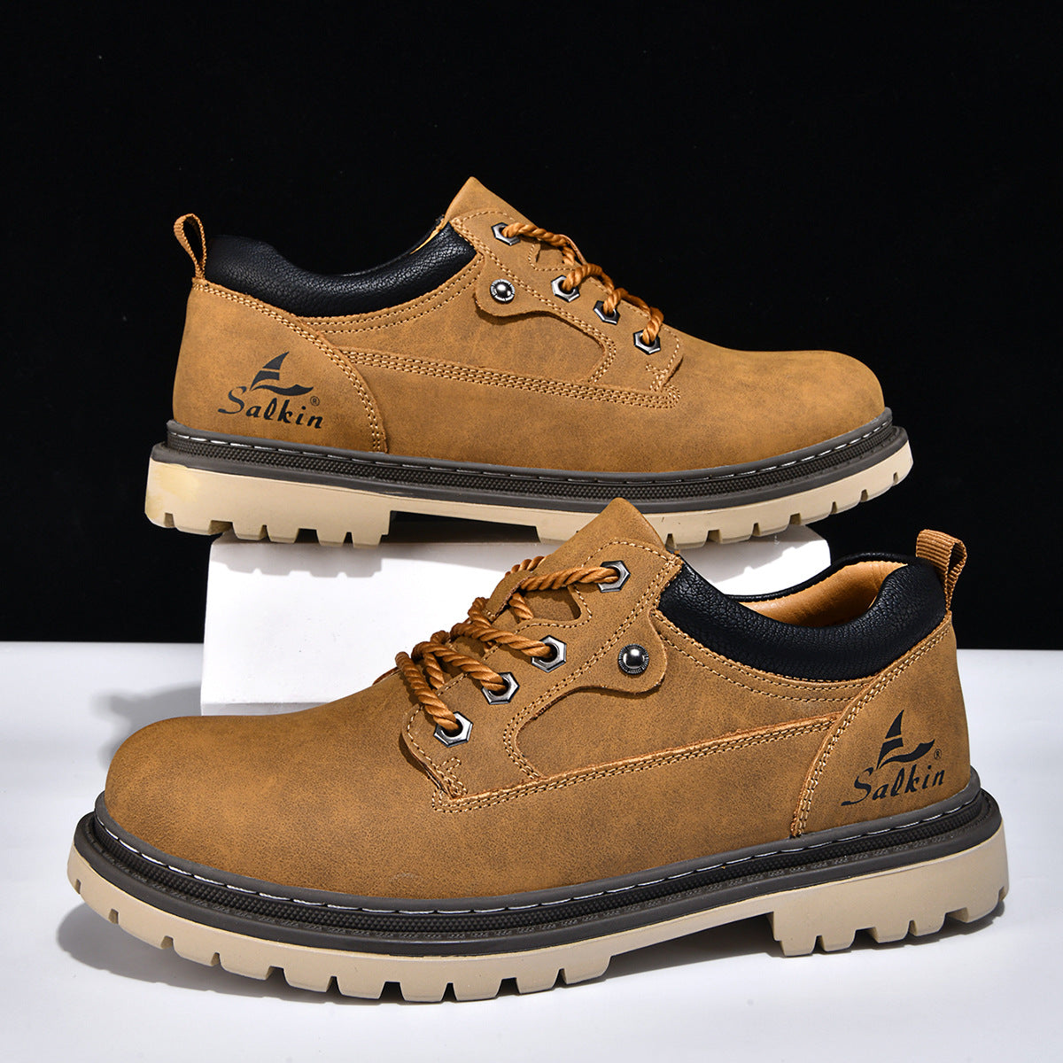 British-style work boots for trendy men, showcasing sturdy leather design and rugged soles