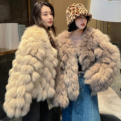 Women's winter faux fox fur coat in a plush full-length design