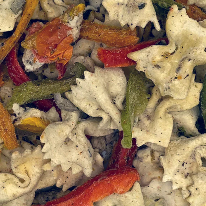 Foundation Outdoors Chicken Pasta Primavera meal in a dry, ready-to-eat state with pasta, chicken, and vegetables visible.