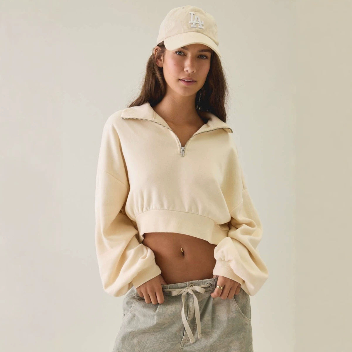 Women's half-zip lapel sweatshirt with loose fit, puff sleeves, and short pullover design in European style