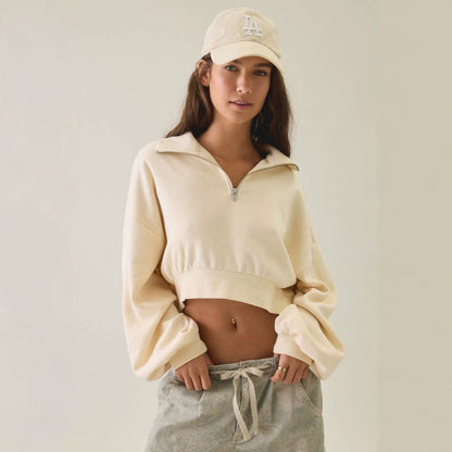 Women's half-zip lapel sweatshirt with loose fit, puff sleeves, and short pullover design in European style
