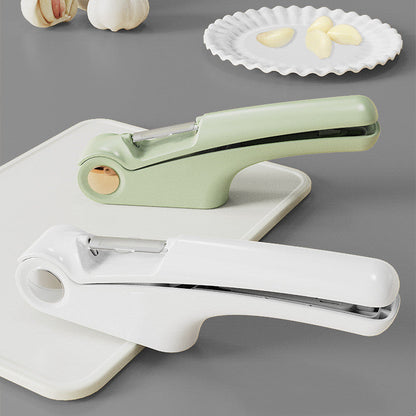 Manual garlic press for household kitchen use, stainless steel handheld garlic crusher tool