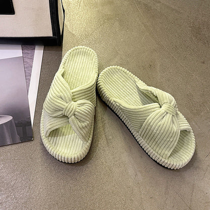 Women's cross-strap flat slide sandals in a simple, comfortable design