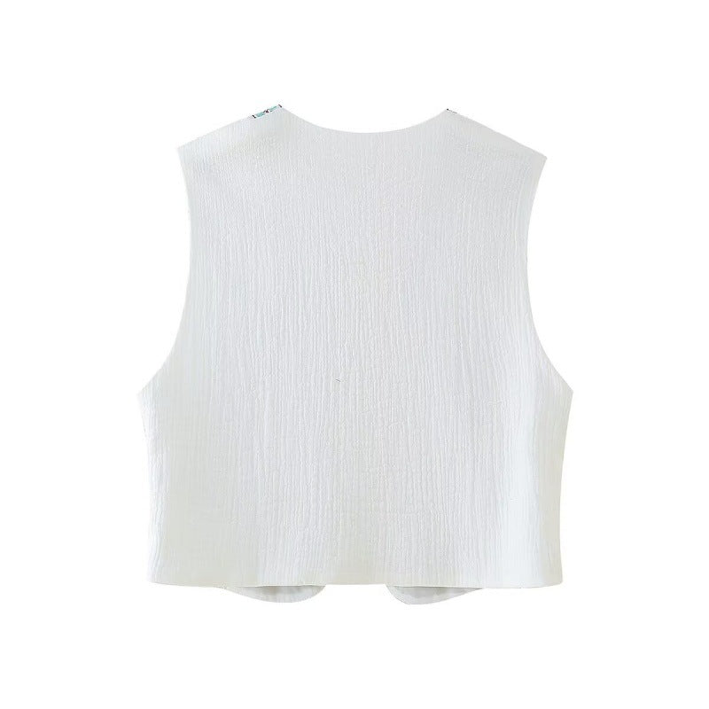 Retro style embroidered vest top with detailed stitching and sleeveless design