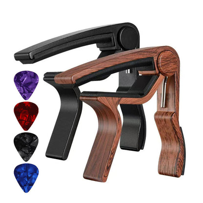 Portable metal guitar capo tuning clip for home use, silver finish.