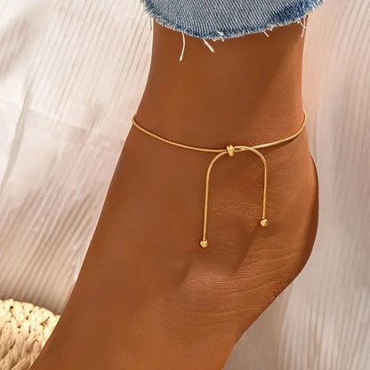 Adjustable ball bead ankle bracelet for women, featuring a delicate beaded design in close-up view