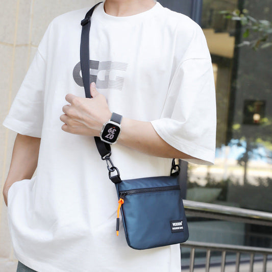 Water-resistant casual shoulder crossbody bag with adjustable strap and compact design