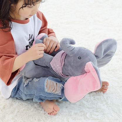 Colorful singing elephant plush toy for kids from BACKUPMYFILESNOW® with large floppy ears and cheerful expression.