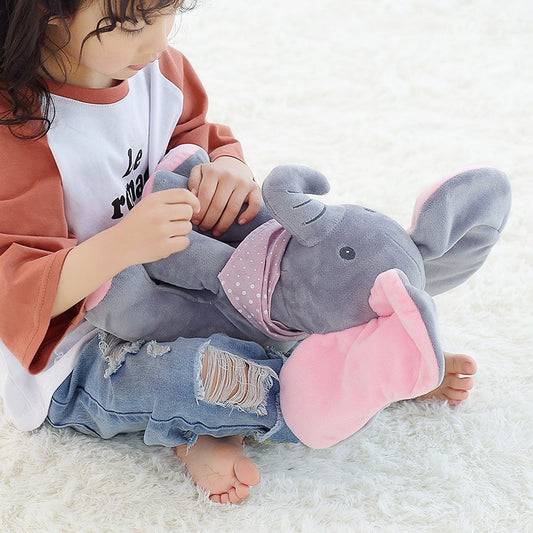 Colorful singing elephant plush toy for kids from BACKUPMYFILESNOW® with large floppy ears and cheerful expression.