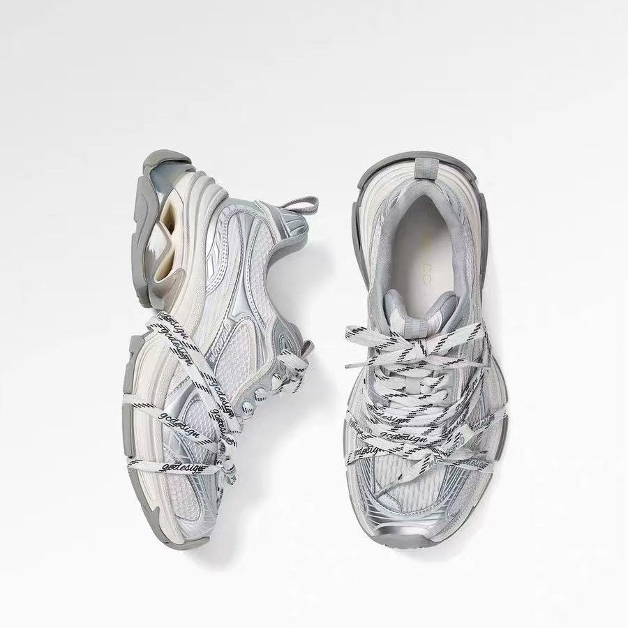 Silver designer dad-style athletic casual shoes in a chunky low-top sneaker design