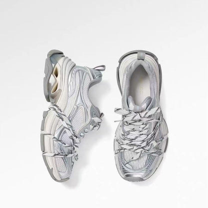 Silver designer dad-style athletic casual shoes in a chunky low-top sneaker design