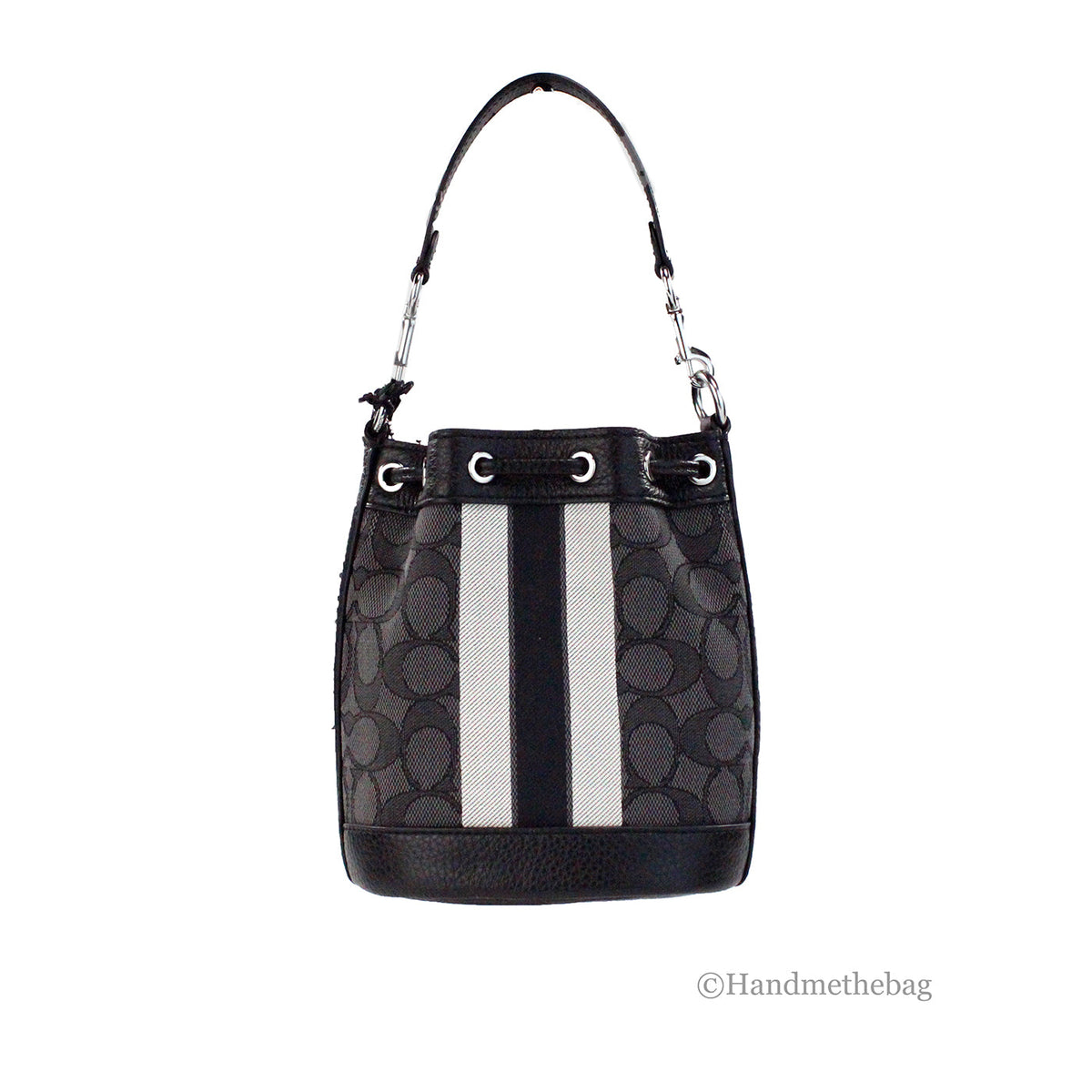 Black Coach Dempsey Mini Jacquard Canvas Patch Crossbody Bucket bag with top handle and adjustable strap, featuring signature design.