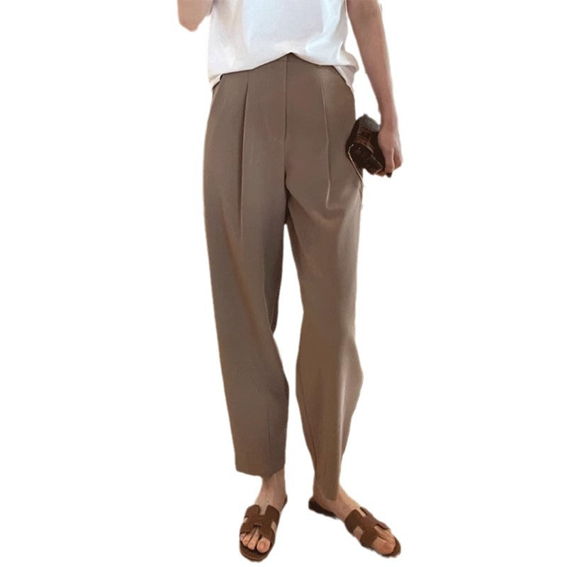 Women's casual cropped harem pants in a relaxed fit with tapered legs