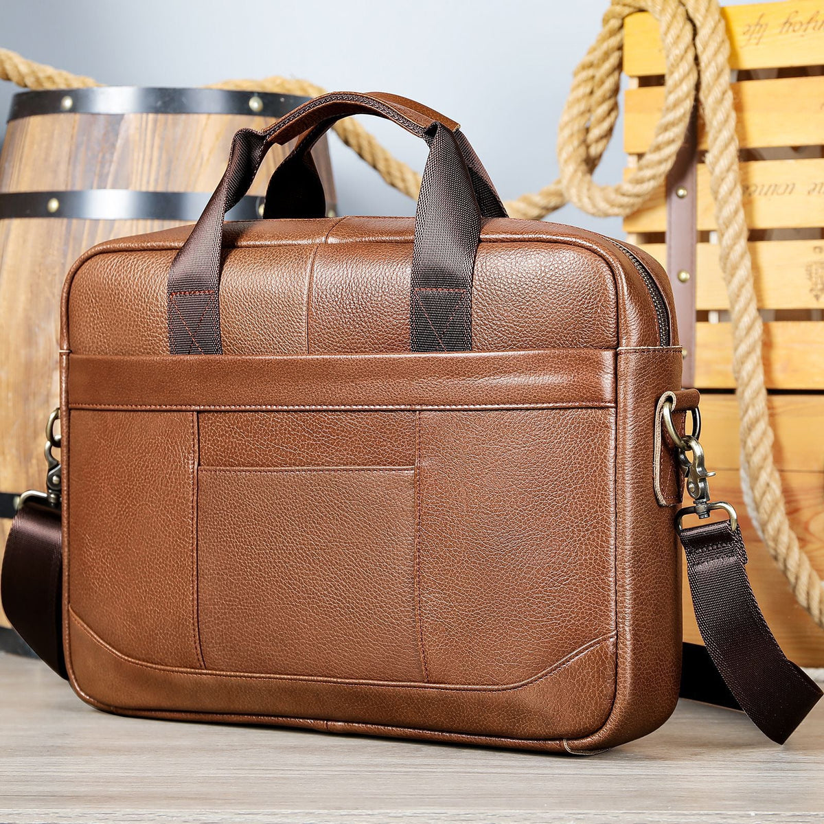 Men's leather computer bag with shoulder strap, designed for carrying official documents and laptops