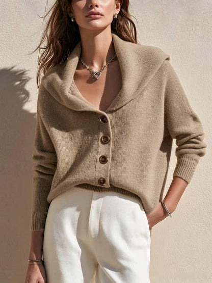 Women's shawl-collar button-front knitted cardigan sweater in a classic design