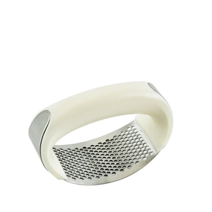 Stainless steel manual garlic press with curved handle for crushing garlic and vegetables in the kitchen