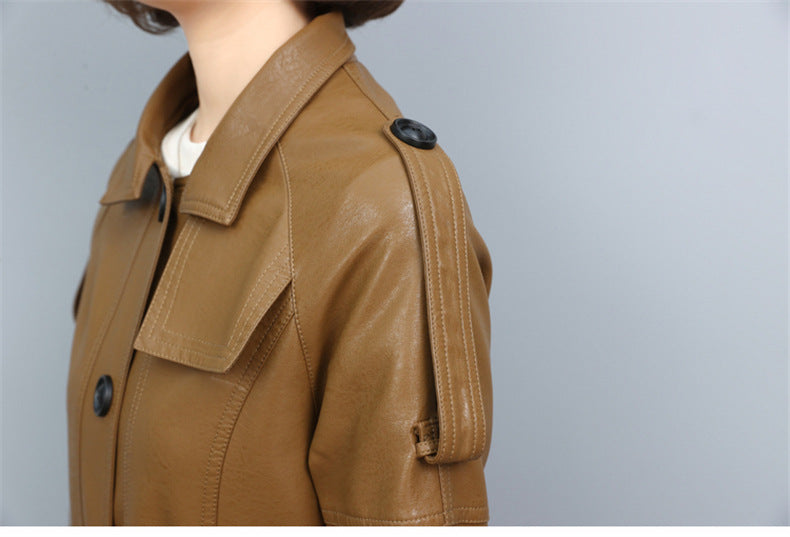 Women’s leather trench coat with turn-down collar, drawstring waist, loose long sheepskin design in solid color