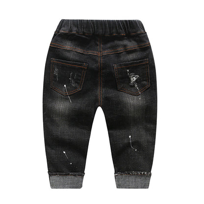 Children's ripped denim pants for boys, casual blue jeans with distressed details
