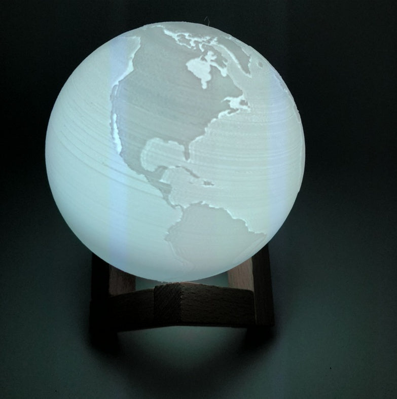 Double color touch 3D printed Earth and Jupiter lamp with illuminated planetary textures