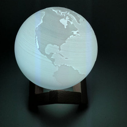 Double color touch 3D printed Earth and Jupiter lamp with illuminated planetary textures