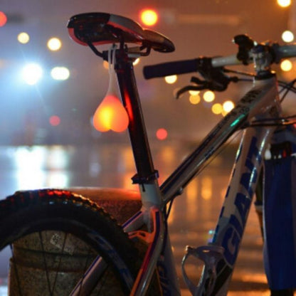 Beating Heart bike rear light, red LED safety light mounted on the back of a bicycle