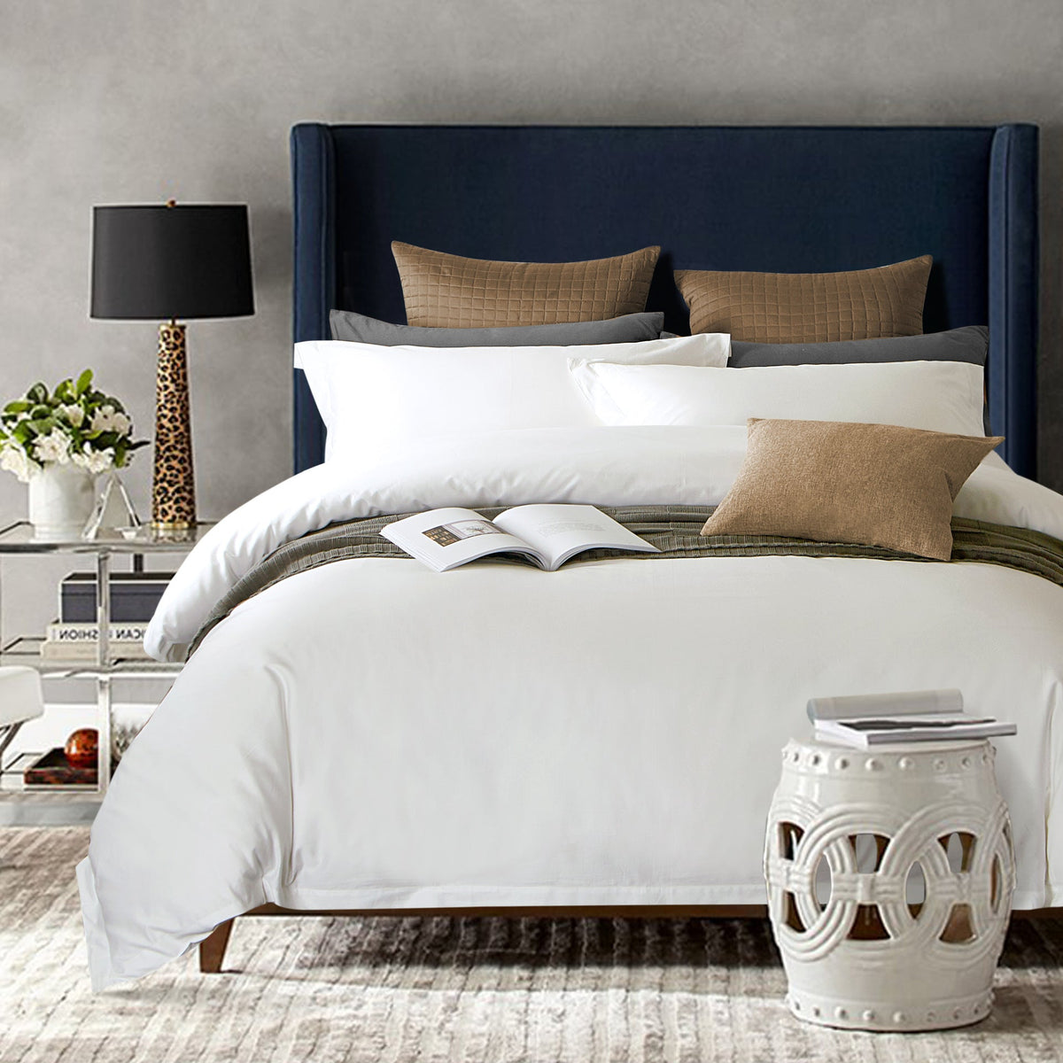 Cotton satin bedding set in soft, smooth fabric, neatly arranged on a bed