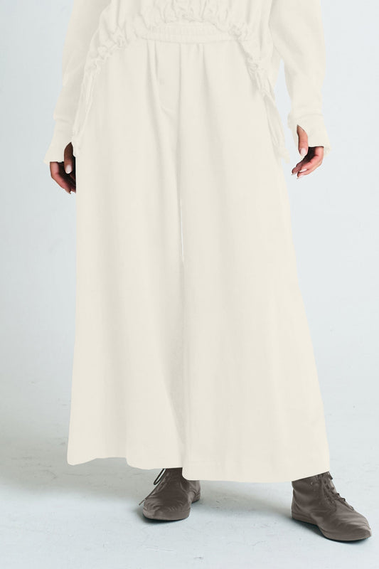 French Terry Flooded Pants by PLANET Lauren G in stone color, featuring relaxed fit and casual style, shown on a model.