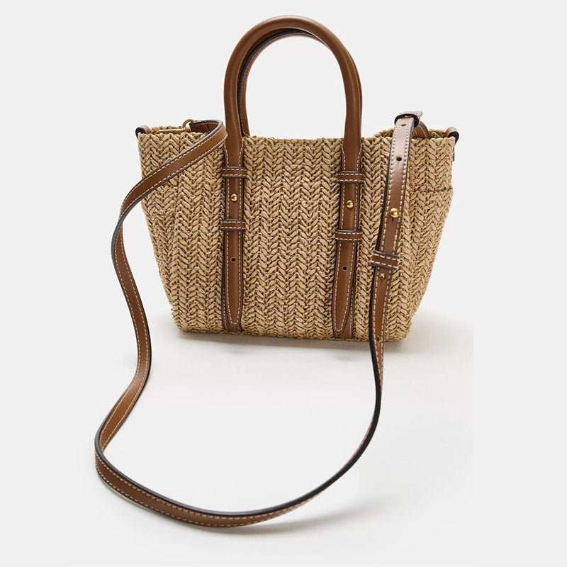 Straw woven hand-held shoulder crossbody bag with textured design and adjustable strap