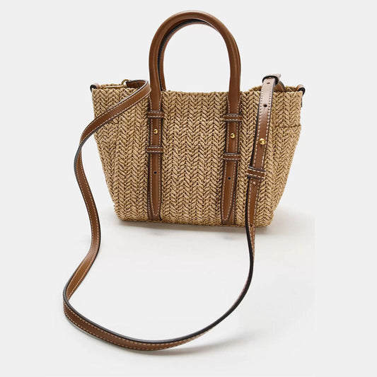 Straw woven hand-held shoulder crossbody bag with textured design and adjustable strap