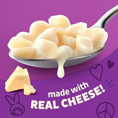 Annie's Homegrown Shells & White Cheddar organic mac and cheese pack with four 24 oz boxes, featuring creamy cheese sauce and pasta shells.