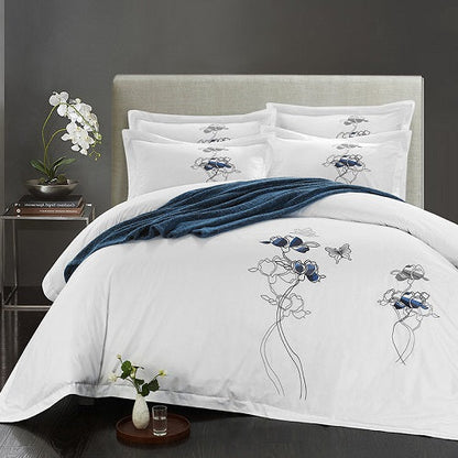 Four-piece cotton bedding set by My Store, showing soft fabric and coordinated bedding pieces