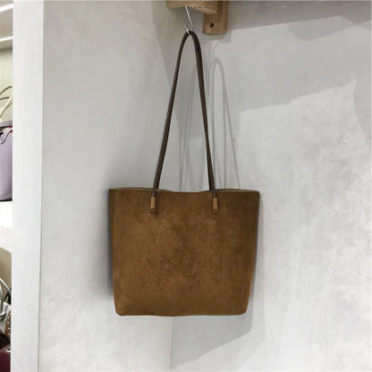Retro suede-like handheld shoulder tote bag in a simple design