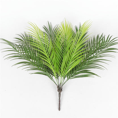 Artificial palm tree leaf green plastic plant in a pot