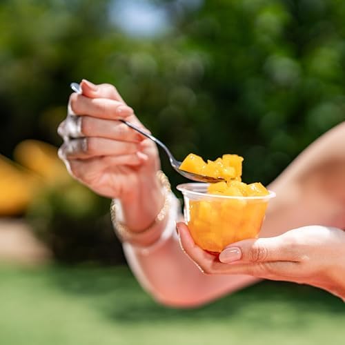 Canned Dole pineapple tidbits and tropical fruit in 4 oz bowls, 12-pack, showing colorful fruit pieces in clear containers