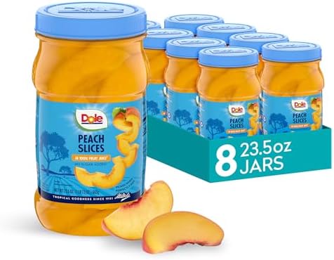Jar of Dole sliced peaches in syrup, 23.5 oz, part of an 8-pack, showcasing fresh peach slices in a clear glass jar.