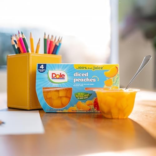 Dole diced peaches in 4 oz fruit snack cups, 12 pack, showing ripe peach chunks in clear plastic bowls