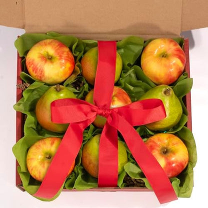 Organic fruit gift basket featuring fresh Honeycrisp apples and green D’Anjou pears, hand-packed and tied with ribbon.
